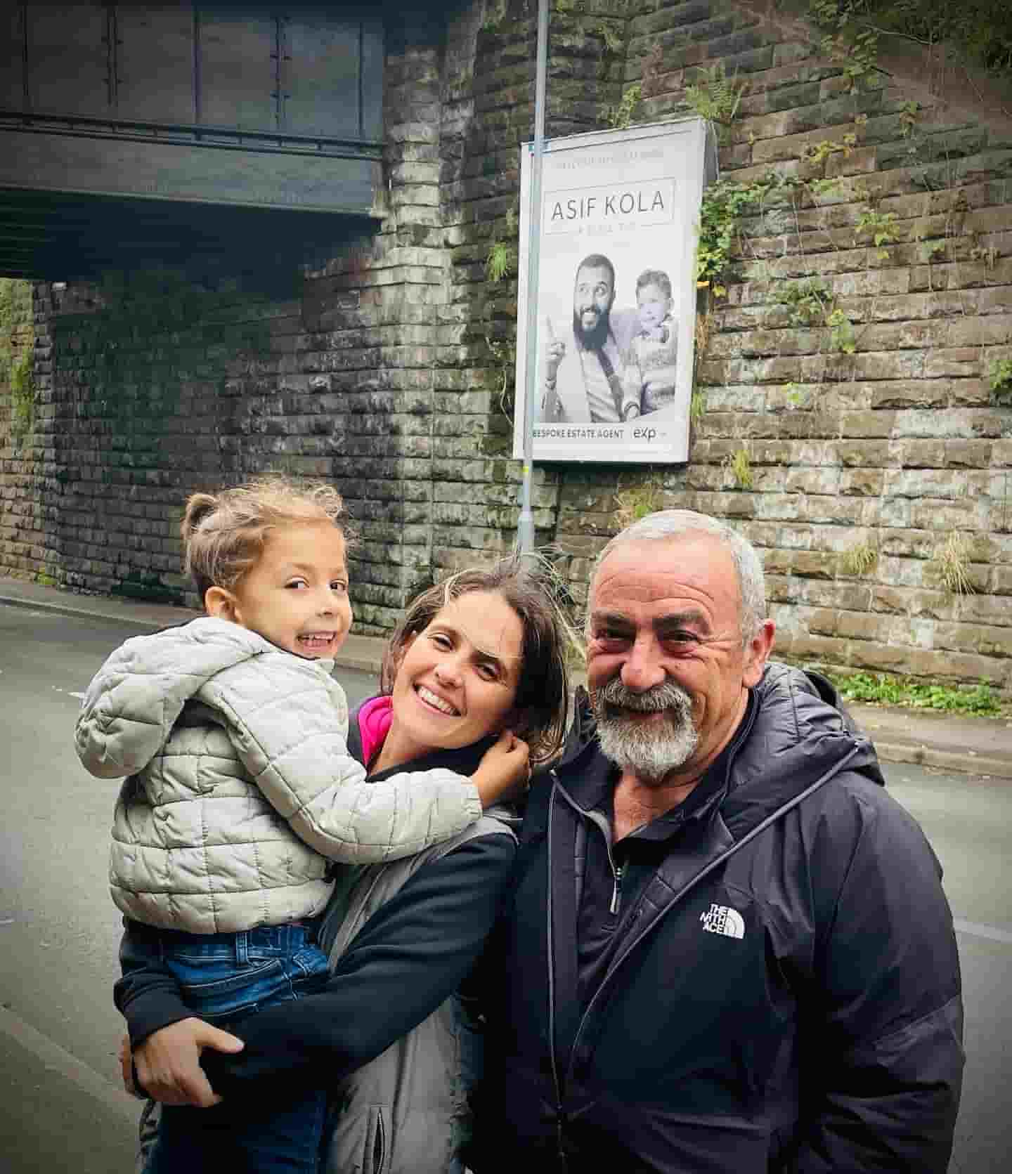 Asif Kola with client outside a sold property in Great Barr