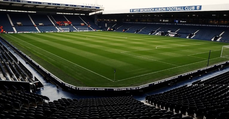 Estate agent in West Bromwich – Asif Kola Realty branding over aerial of West Bromwich stadium
